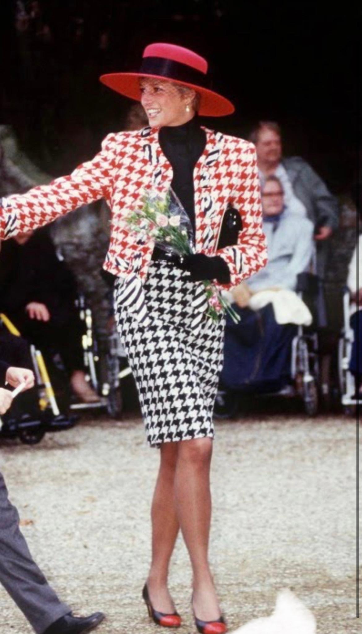 Moschino Cheap and Chic red and white houndstooth tweed scarf jacket from the early 1990's.
Featuring a classic timeless style this jacket can be worn for any occasion.
As famously seen on Princess Diana in 1990 and 1991.
Made in Italy.
Fully