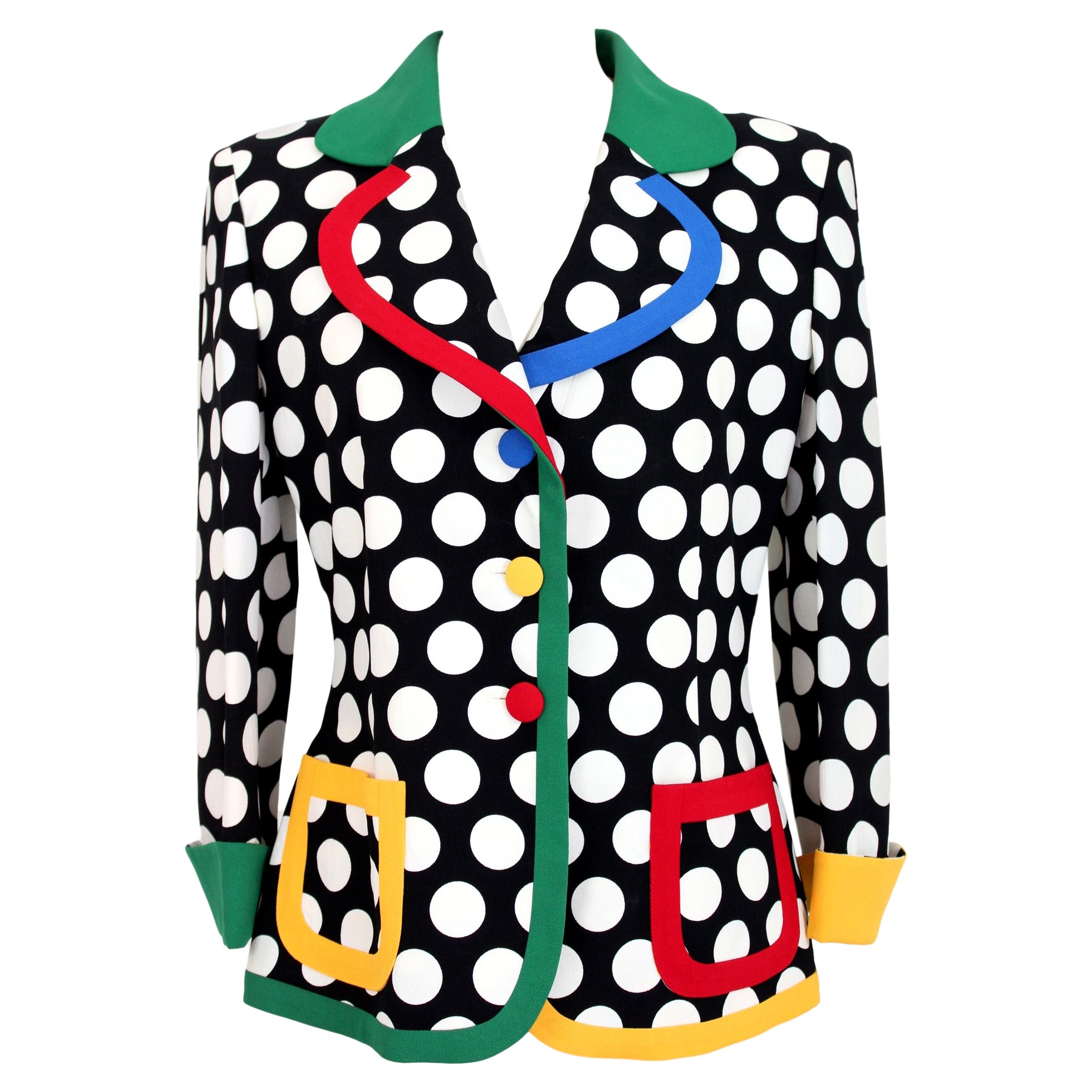 Moschino Cheap and Chic 90s vintage women's jacket. Blazer with black and white polka dots, colored profiles. Internally lined. 100% rayon. Made in Italy. Excellent vintage condition.

Size: 44 It 10 Us 12 Uk

Shoulder: 44 cm
Bust / Chest: 47