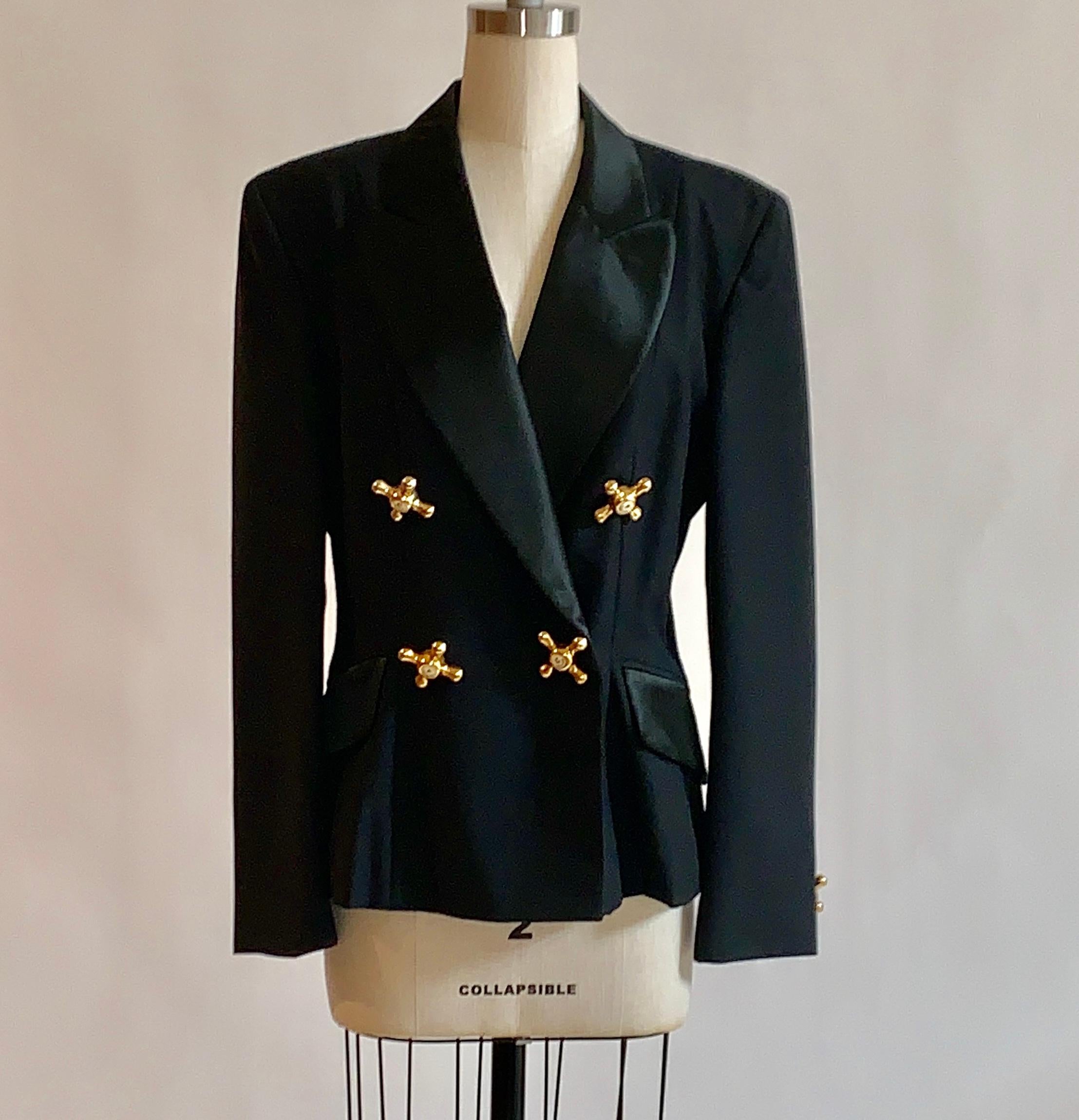 Vintage 1990s Moschino Cheap & Chic black tuxedo style jacket with gold faucets labeled 
