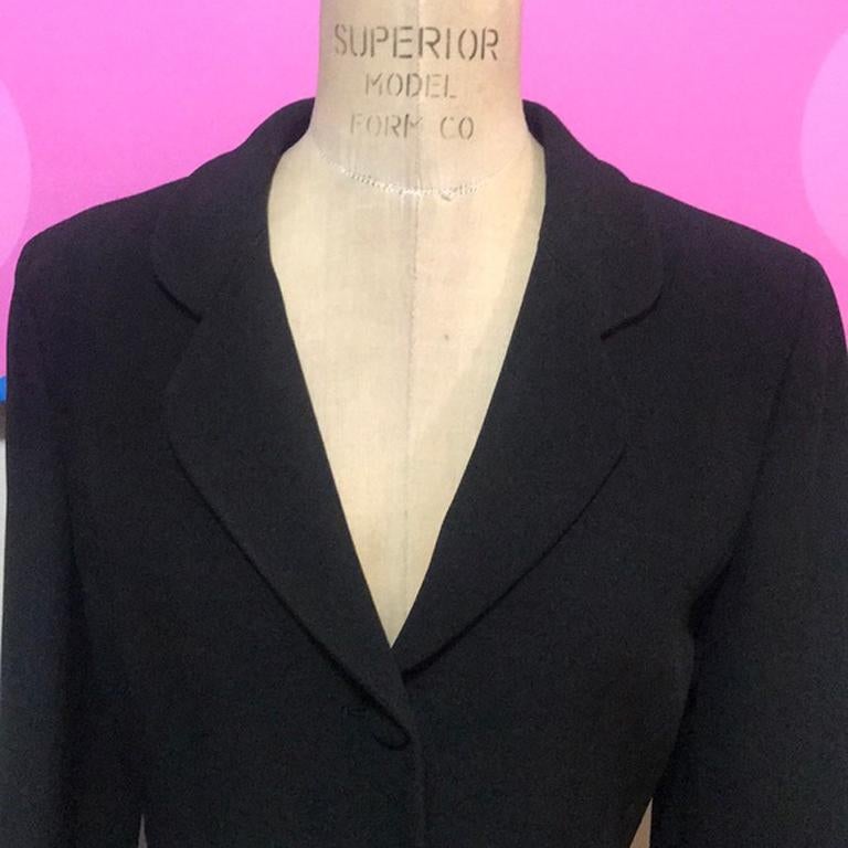 Moschino cheap chic black blazer

This Unique black blazer by Moschino has the word CHEAP in patches across the bottom. Perfect to wear with black pencil pants or pencil skirt! The patch letters buckle in a few places, but this is the nature of this