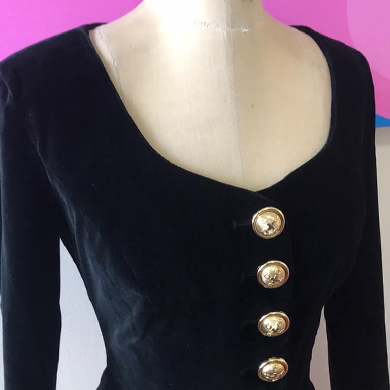 Moschino cheap chic black stretch velvet jacket

Vintage Moschino is always a great find and this stretch velvet fitted jacket is as wearable today as when it was made ! Pair with black skinny pants and boots for a great look
Size 6
Across chest -