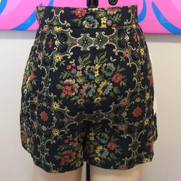 Moschino cheap chic brocade floral shorts 

These unique high waist shorts by Moschino Cheap & Chic line are a vintage dream! New and never worn with tags. Brocade fabric has nice floral design. Perfect for photo shoot, video shoot or stage. tiny