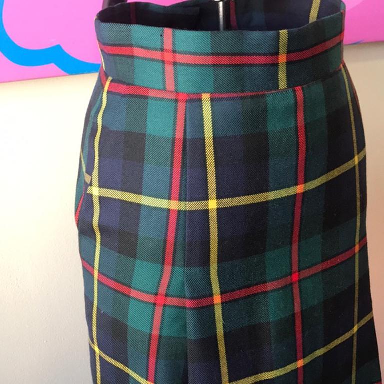 Moschino cheap chic green wool plaid skirt

Unique vintage skirt by Moschino Cheap and Chic ! Two front vents and side pockets. Pair with simple black turtleneck sweater tights and boots for a cute Fall look. Brand runs small.  Cute heart shaped