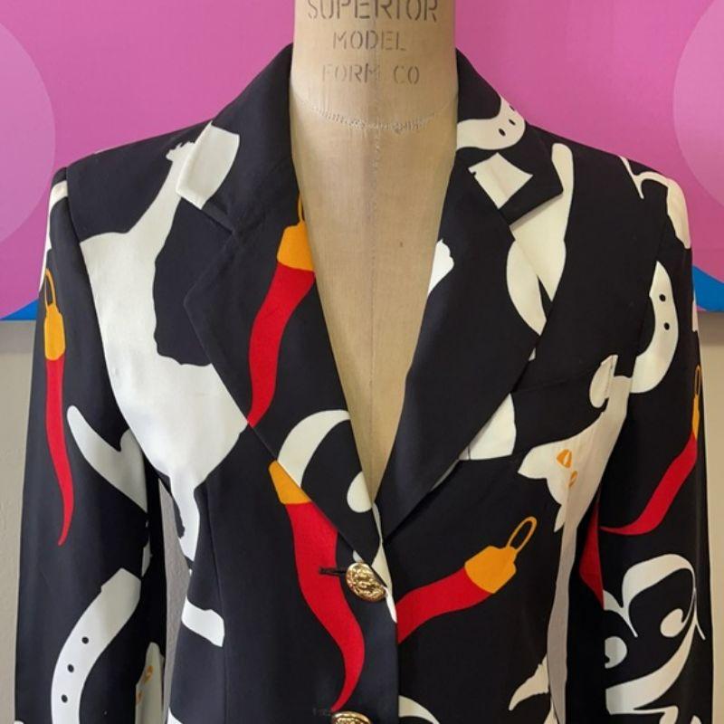 Moschino cheap chic hot pepper cat blazer

The design on this jacket is super fun with hot papers, cats, lucky horse shoes and more! Be retro cool wearing this vintage piece and be the conversation starter in the room! Pair with white jeans or black