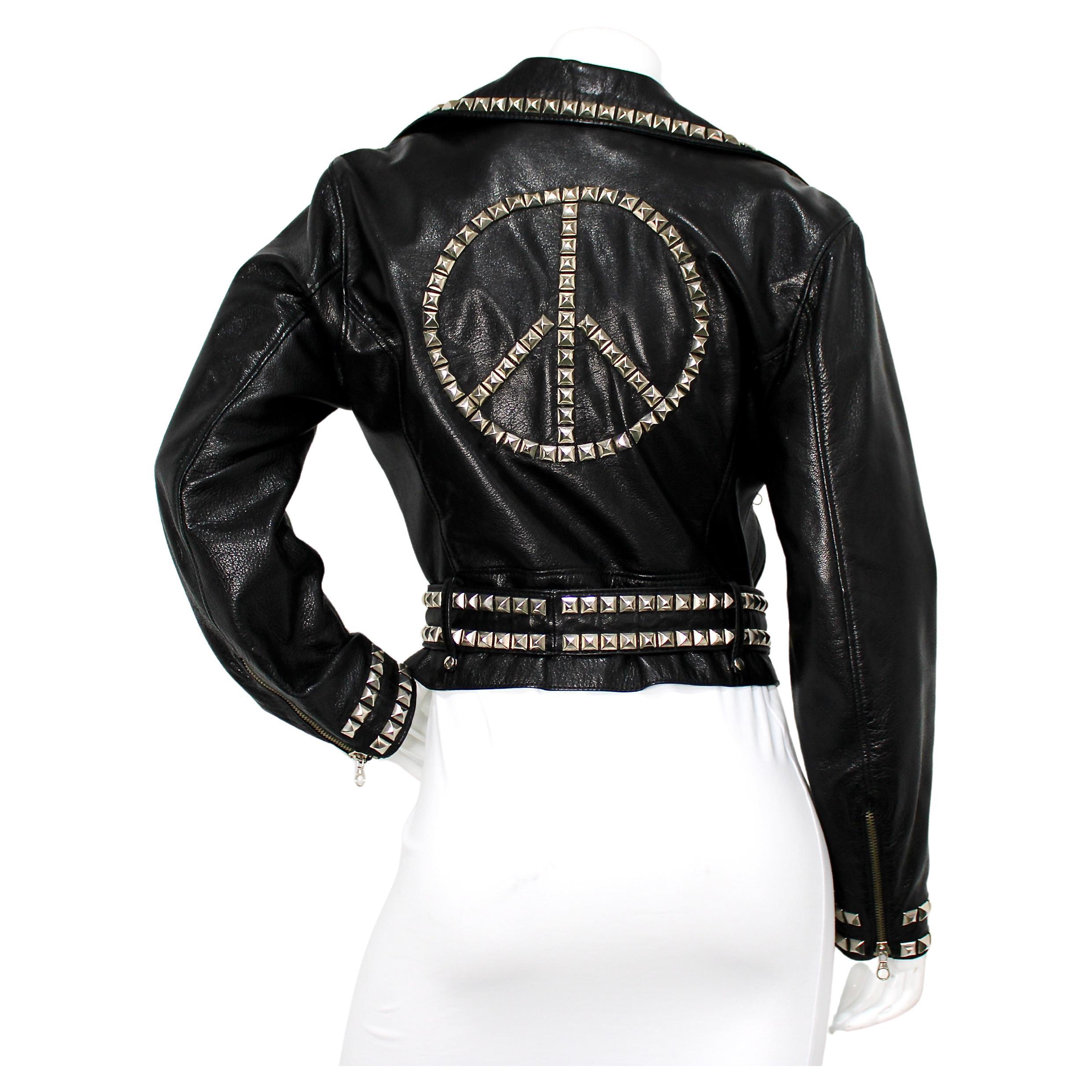 Moschino Cheap 
Chic Peace Sign Studded Belted Black Leather Jacket For Sale