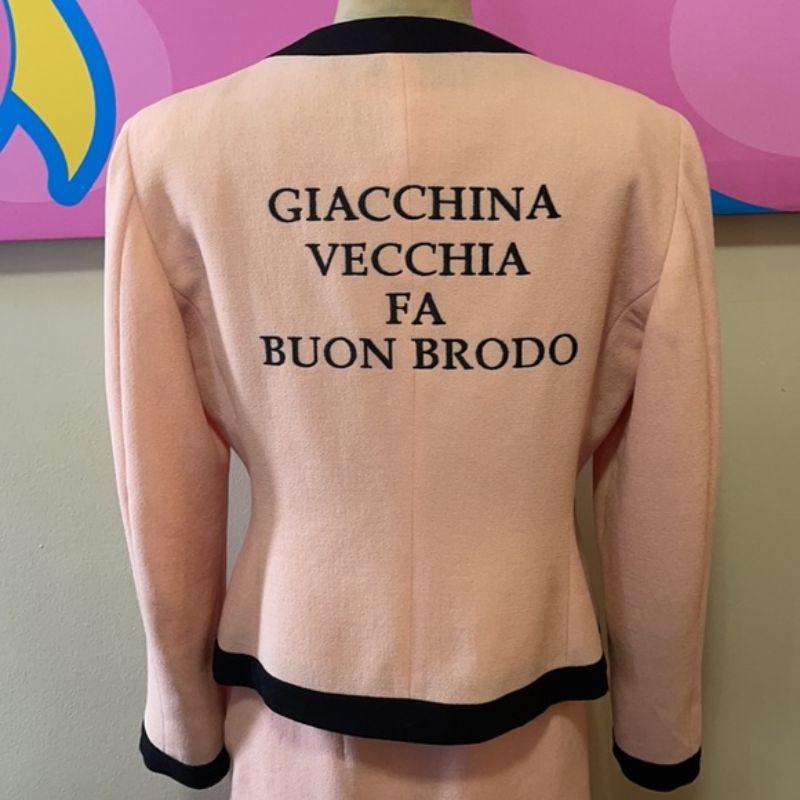 Moschino cheap chic pink black wool crepe suit

Be retro glam wearing this vintage skirt suit by Moschino Cheap and Chic. Estimated to be from 1996. Made of wool crepe. Perfect for special occasion dressing where you need a dose of humor. Brand runs