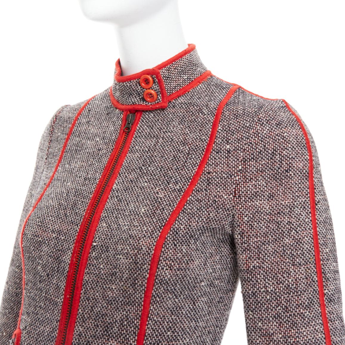 MOSCHINO CHEAP CHIC Vintage grey wool tweed red piping  moto jacket IT38 XS
Reference: CNLE/A00370
Brand: Moschino
Collection: Cheap & Chic
Material: Tweed
Color: Red, Grey
Pattern: Tweed
Closure: Zip
Lining: Red Fabric
Extra Details: Zips at