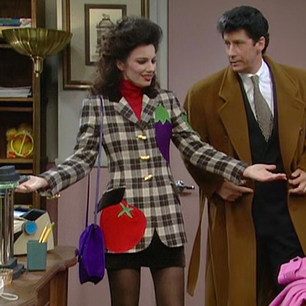 Moschino Cheap & Chic plaid wool vegetable blazer as seen on Fran Dresher on the sitcom The Nanny. 
Features embroidered appliqués of a snow pea, tomato, eggplant, & carrot
Two side flap pockets with brown velour trim
Brown velour collar
Autumn