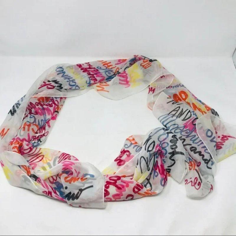 Moschino cheap chic white silk graffiti scarf vintage

This sheer silk Moschino scarf with graffiti print is a wonderful piece for summer! Or that Zoom meeting! Rectangle shape

Length - 64 inches
Width - 20 inches
100% Silk
A few strings hanging