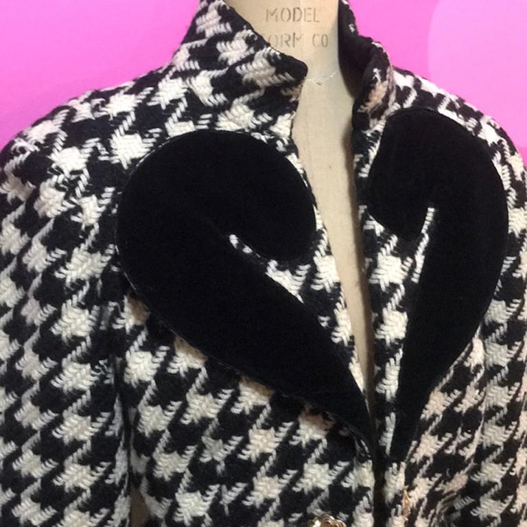 Moschino cheap chic wool question mark jacket

The iconic Moschino Question Mark or Heart Jacket in a black velvet trim in a wool and mohair Houndstooth jacket ! Perfect for fall paired with black skinny pants or skirt! Elastic on buttons have