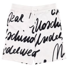 Moschino Baumwollshorts mit All-Over-Logo-Druck