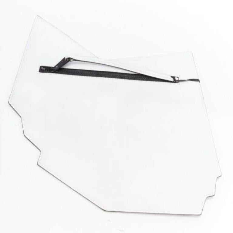 MOSCHINO COUTURE 2020 Runway Picasso Musical Note Score white leather clutch bag
Reference: TGAS/D00504
Brand: Moschino
Designer: Jeremy Scott
Collection: SS2020- - Runway
Material: Leather
Color: White, Black
Pattern: Abstract
Closure: Zip
Lining: 