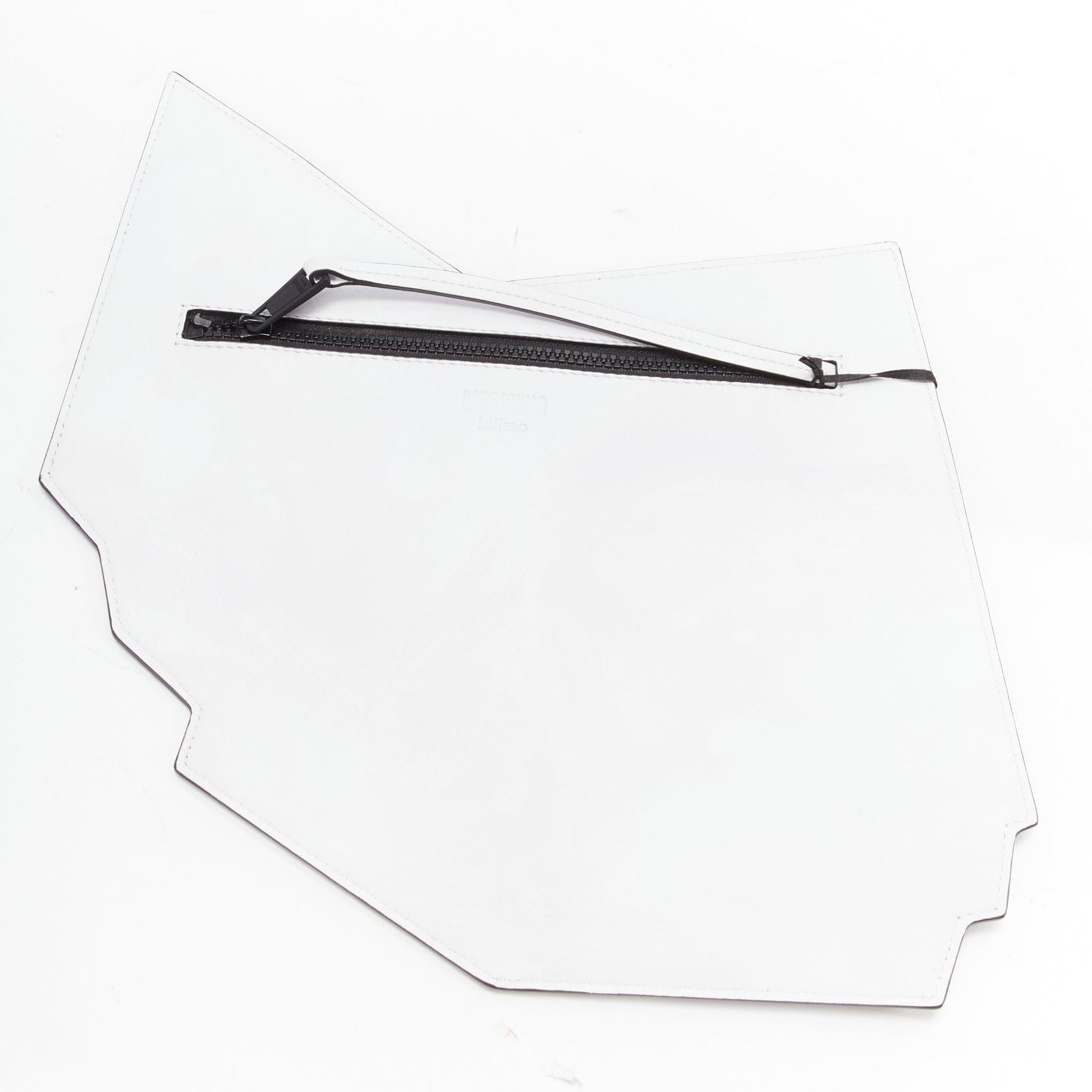 MOSCHINO COUTURE 2020 Runway Picasso Musical Note Score white leather clutch bag
Reference: TGAS/D00503
Brand: Moschino
Designer: Jeremy Scott
Collection: SS2020- - Runway
Material: Leather
Color: White, Black
Pattern: Abstract
Closure: Zip
Lining: 