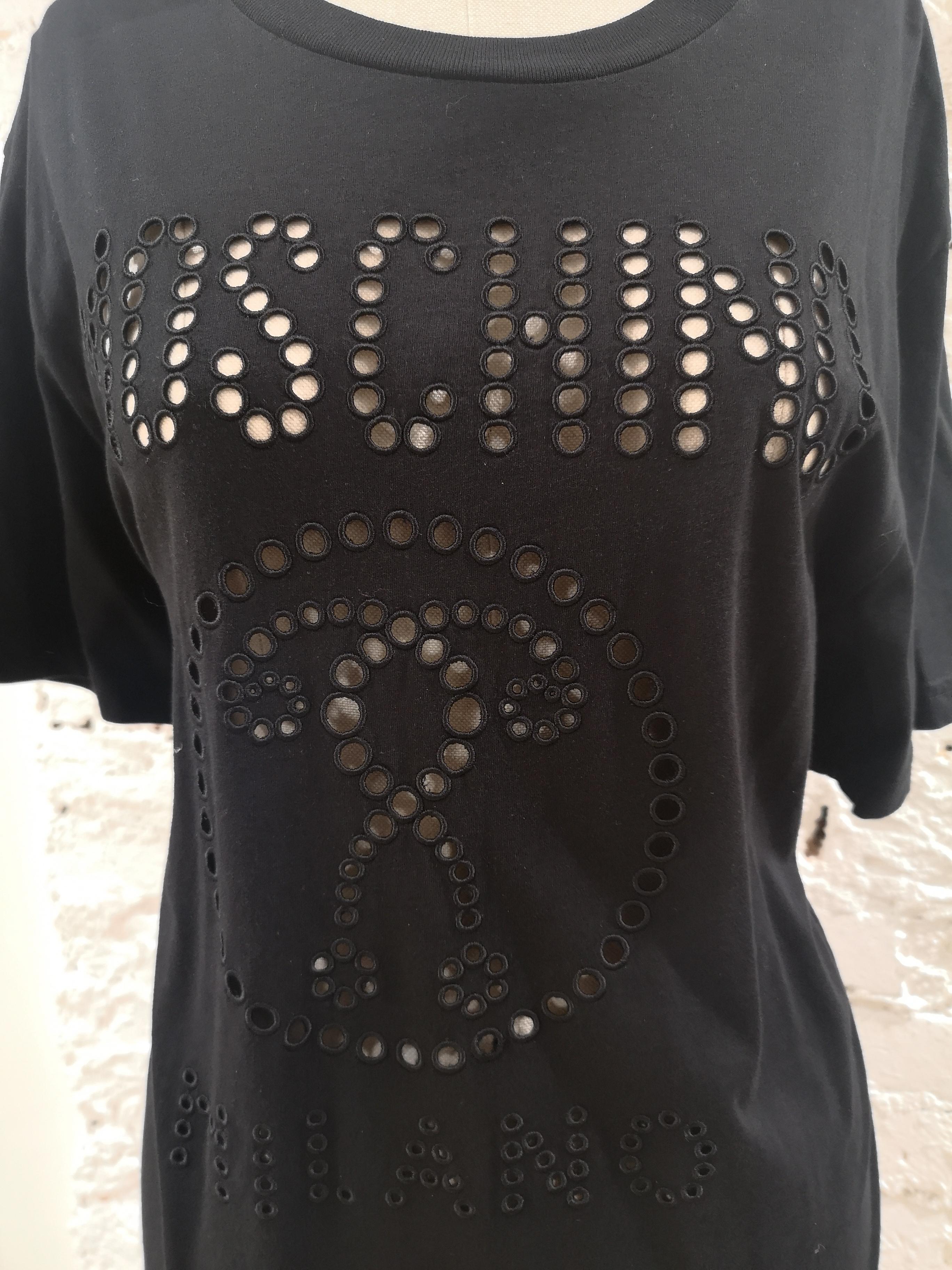 Moschino Couture Black cotton T-shirt NWOT
totally made in italy in size L 
composition: 100% cotton
total lenght 76 cm
shoulder to hem 22 cm