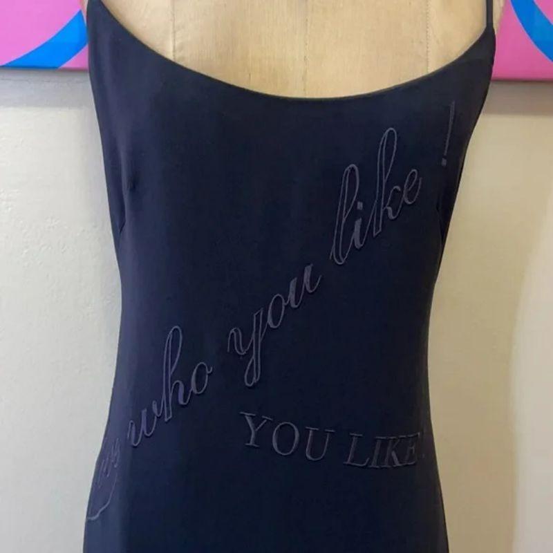 Moschino couture black love who you like dress

This adorable embroidered dress is perfect for date night! The saying says 