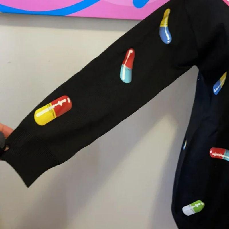 Moschino couture capsule pill merino wool sweater

Fall dressing shines wearing this merino wool sweater by Moschino Couture with fun capsule pill design all over. Pair with black leggings and ankle boots for a finished look.

Size XXS
Across chest
