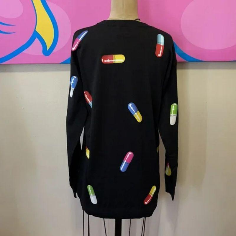 moschino pill sweater