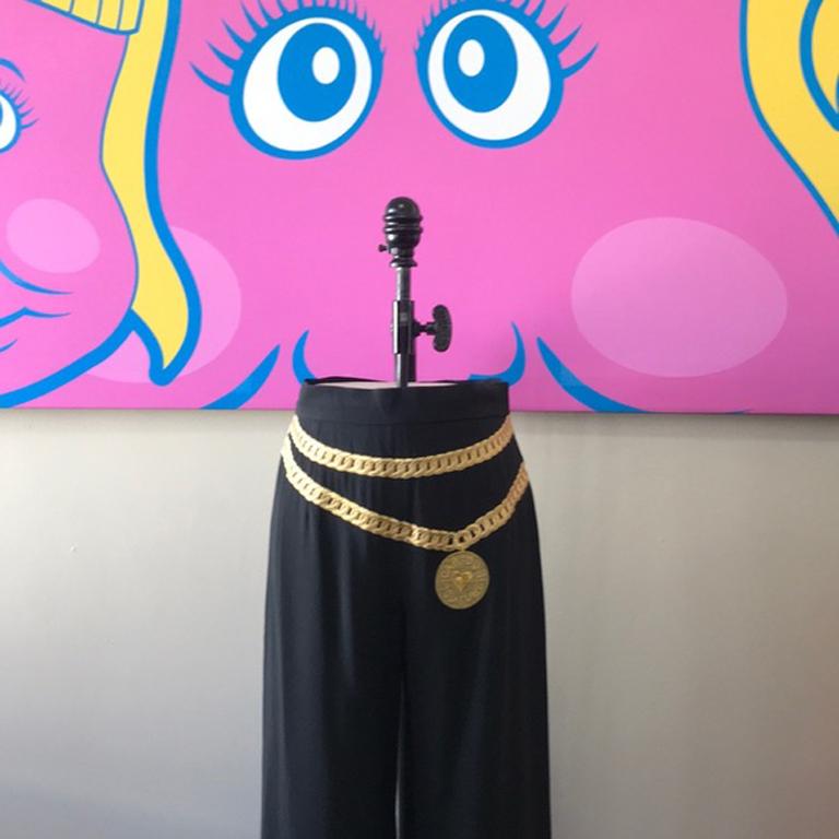 Moschino couture cartoon black wide leg pants


Iconic Vintage Moschino Cartoon Couture. Pair with black turtleneck Sweater and ankle boots for a nice Fall look.
Brand runs small
Size 10
Wide leg pants.
Across waist- 14 in.
Across hips - 19 1/2