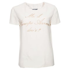 Moschino Couture, Cream-colored top with gold text.