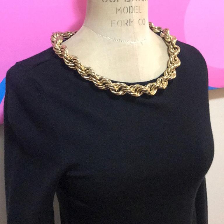 Moschino couture gold chain black sweater nwt


Moschino updates the classic crew neck sweater with a u Kaye chain at the neck ! Perfect for Fall paired with black skinny pants and ankle boots
Size 38
Across the chest - 14 1/2 in.
Across the waist -