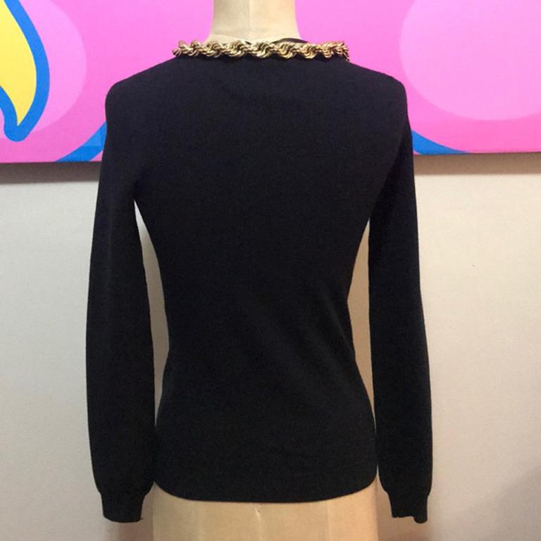 black and gold sweater