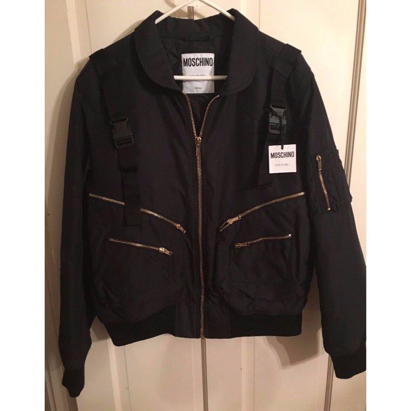 Moschino Couture Jeremy Scott Ready to Bear Outwear Buckled Strap Bomber Jacket

Additional Information:
Material: Polyester
Color: Black/Gold
Pattern: Teddy Bear Collection    
Style: Jacket
Size: IT 52
100% Authentic!!!
Condition: New with tags: