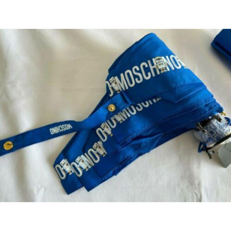 Moschino Couture Jeremy Scott Roboter-Schirm mit blauem Schirm, in einen Teddybären eingelassen im Angebot 1