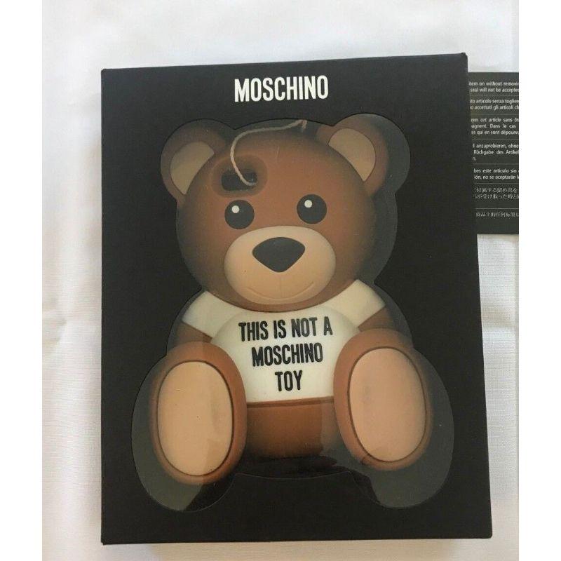 Moschino Couture Jeremy Scott Teddy Bear this is Not a Toy Case 4 iPhone 5 5S 5C

Additional Information:
Material: Plastic
Color: Brown
Pattern: Teddy Bear
100% Authentic!!!
Condition: Brand new in the box