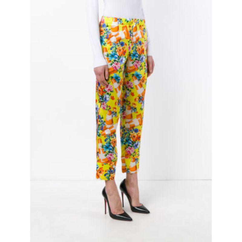 Moschino Couture Jeremy Scott Traffic Cone Floral Trousers Pants Construction

Additional Information:
Material: 55% Cotton, 45% silk
Color: Multi-color/Yellow    
Pattern: Floral
Style: Casual Pants
Size: 44 IT
100% Authentic!!!
Condition: Brand