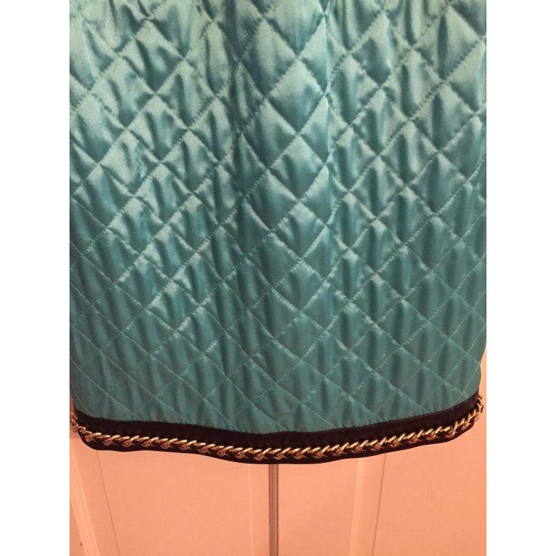 Robe Moschino Couture Jeremy Scott turquoise matelassée en cuir et satin Pour femmes en vente