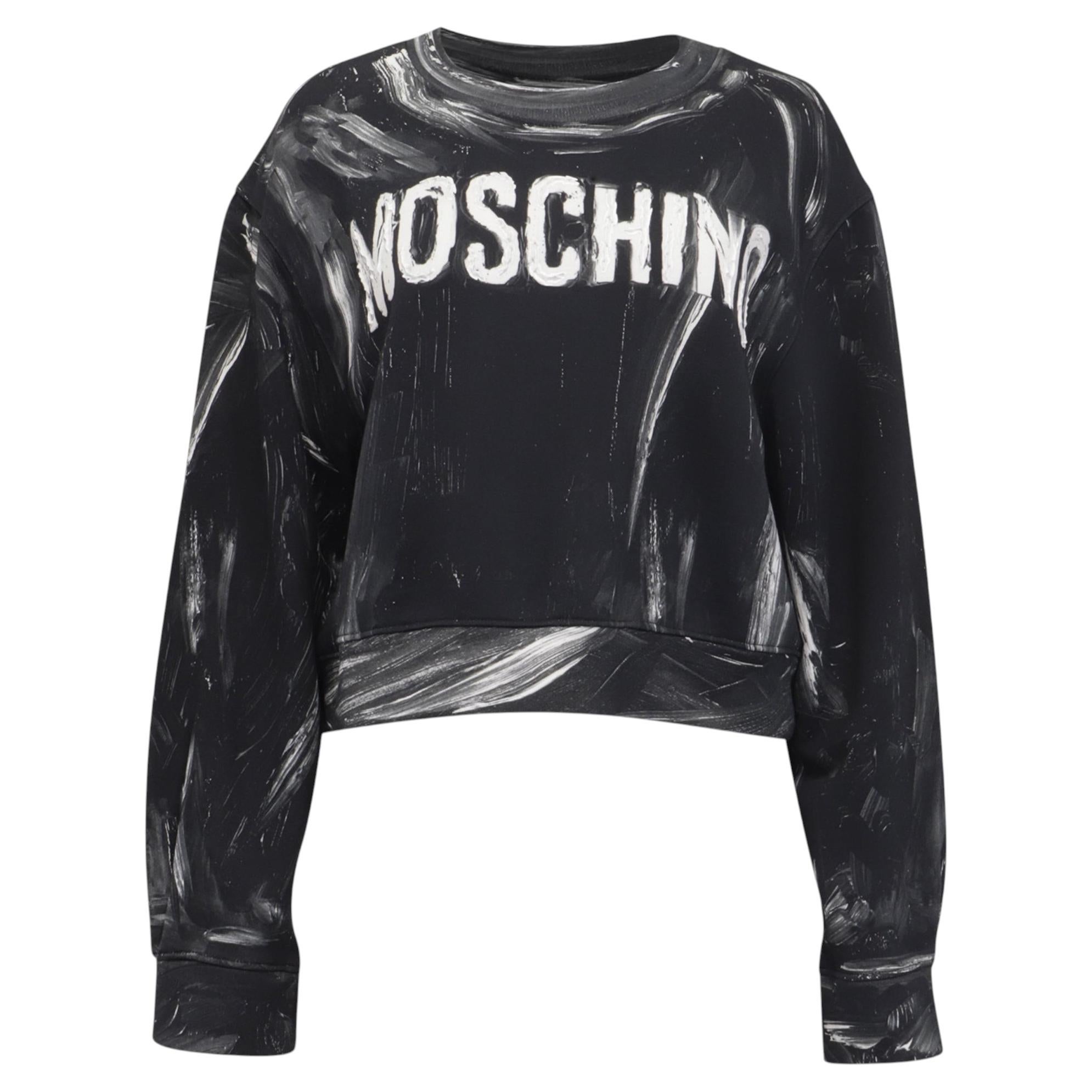 Felpa Moschino Couture con dettagli "Logo Paint" in cotone nero