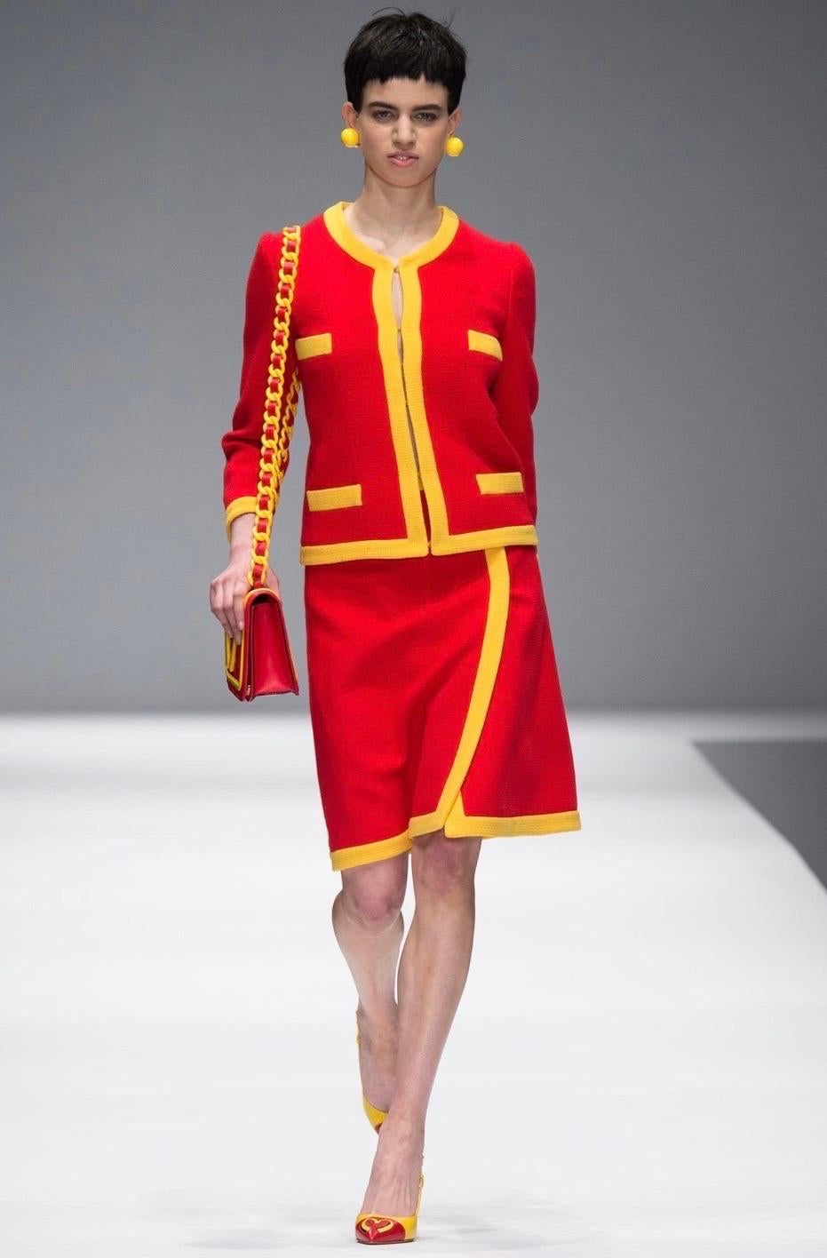Moschino McDonalds red and yellow tweed blazer from the Fall Winter 2014 fast food collection and as seen on the runway. 
Designed by Jeremy Scott and was his first runway collection with Moschino 
Hook and eye front closure
Snap button cuff