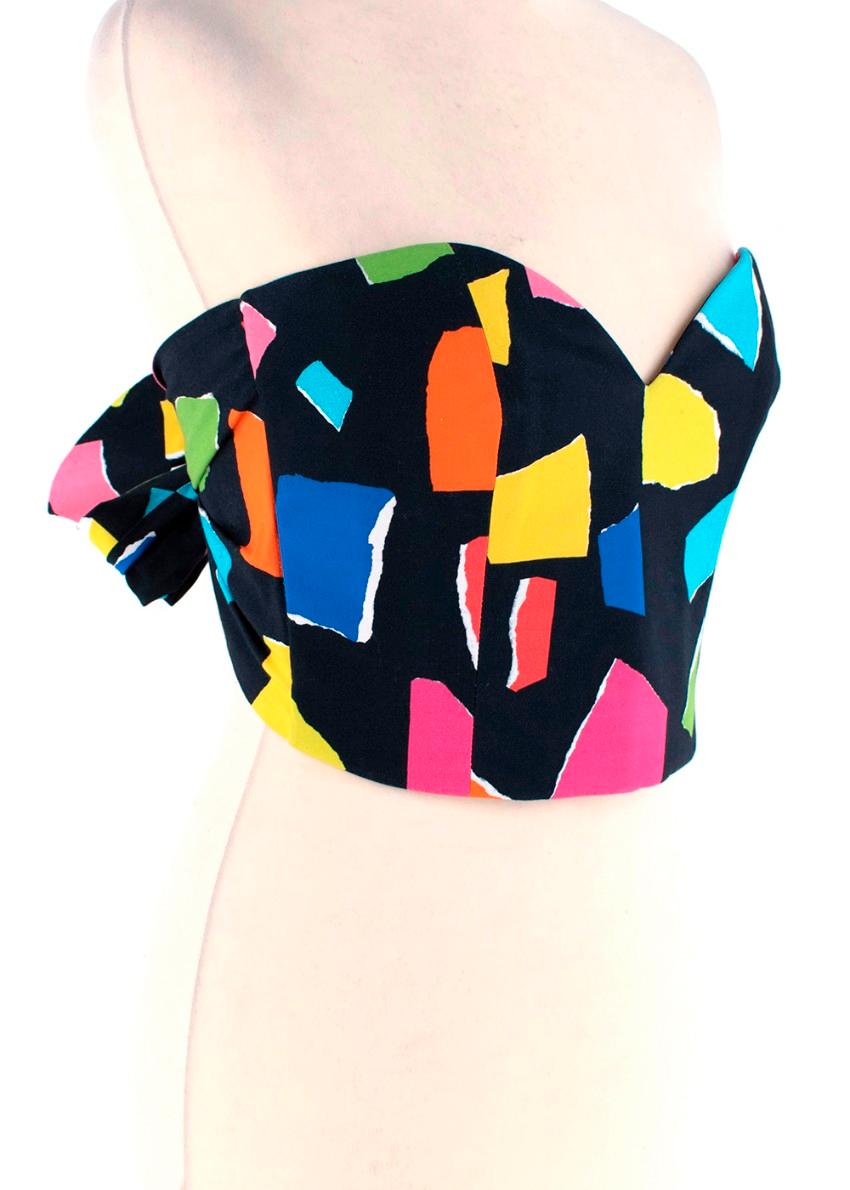 Moschino Couture Multicoloured Tie-Back Bustier Top

- Heart shaped neckline
- Corset style with boning panelling to keep shape
- Tie up at the back 
- Multi-coloured shape pattern 

Materials:
Exterior fabric:
- 95% Cotton
- 5% Other Fibres