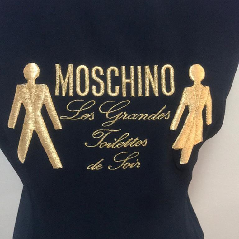 Moschino couture navy blue fitted top

Unique vintage top by Moschino Couture with humorous embroidery about the men’s and women’s toilets. From the Spring / Summer 1991 Collection. Slight fading. Pair with black skinny pants and wear under fitted
