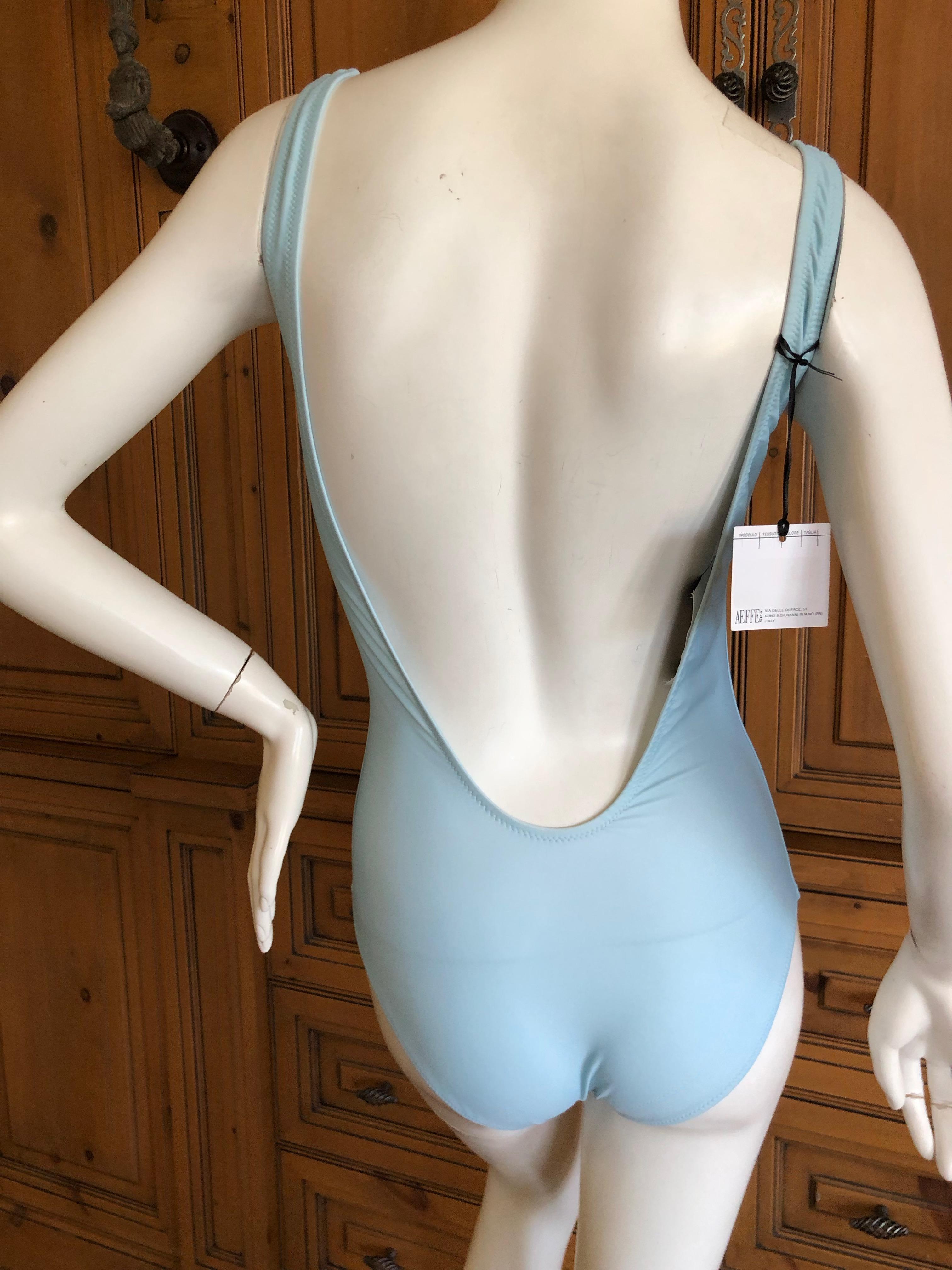 Moschino Couture One Piece Swim Suit New with Tags
SIze M-L
Bust 36