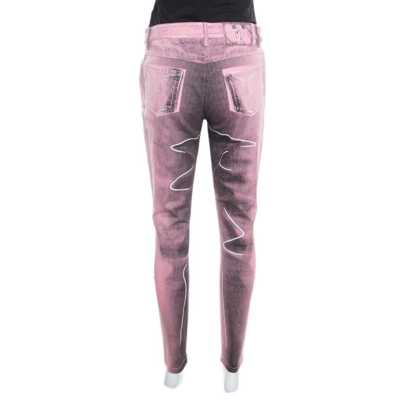 Now style those fabulous T-shirts of yours with these amazing pink and black jeans from Moschino Couture. They are made of a cotton blend and feature a chic print. They flaunt a slim fit silhouette and come with a front button fastening, belt loop