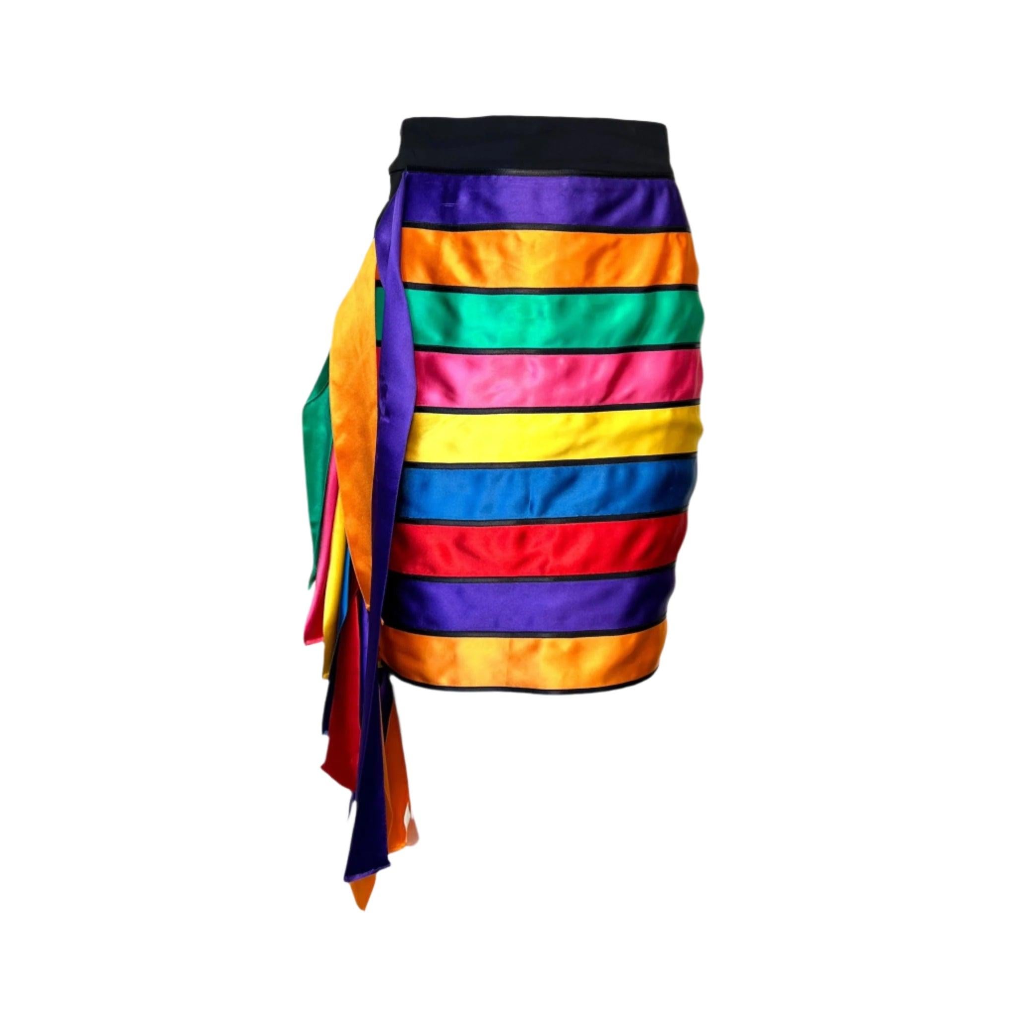 Joyful and rare Moschino Couture Spring 1993 rainbow ribbon skirt. What's more fun than rainbows and ribbons? The skirt was photographed in September 1992 for the Moschino Spring 1993 Ready to Wear Runway Show Presentation. Rows of violet, orange,