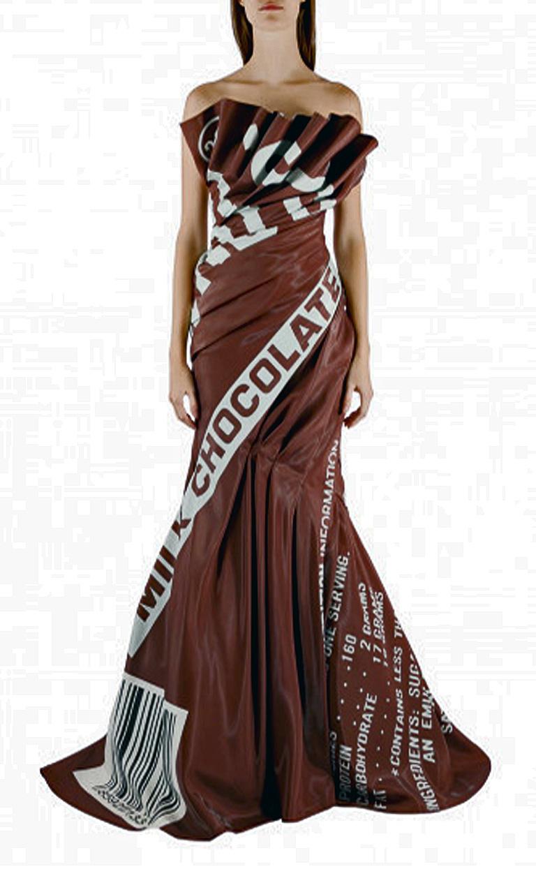 Moschino Couture rare Hershey Chocolate Bar gown by Jeremy Scott for Moschino.   Re the Fall 2014 show, according to fashion reviewer, Tim Blanks, “Scott's embrace of consumer culture in the name of Moschino was bright, brash, and ingenious.”    The