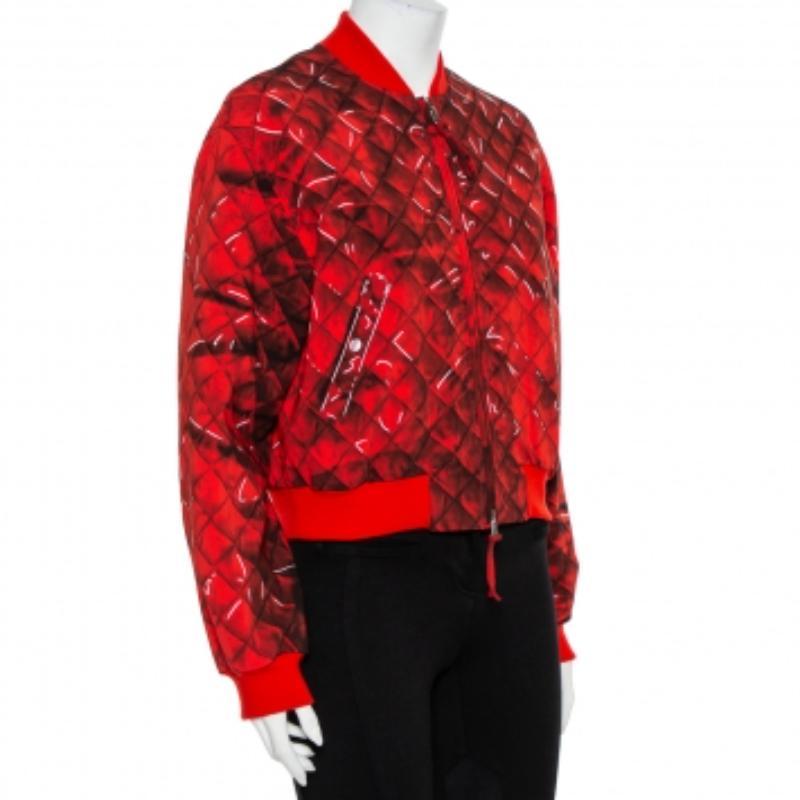 To counter the cold climes, wrap yourself in the warmth of this bomber jacket from Moschino Couture. It comes crafted from a blend of fabrics and has long sleeves, ribbed hem and cuffs and zip fastening to the front. However, what catches your eye