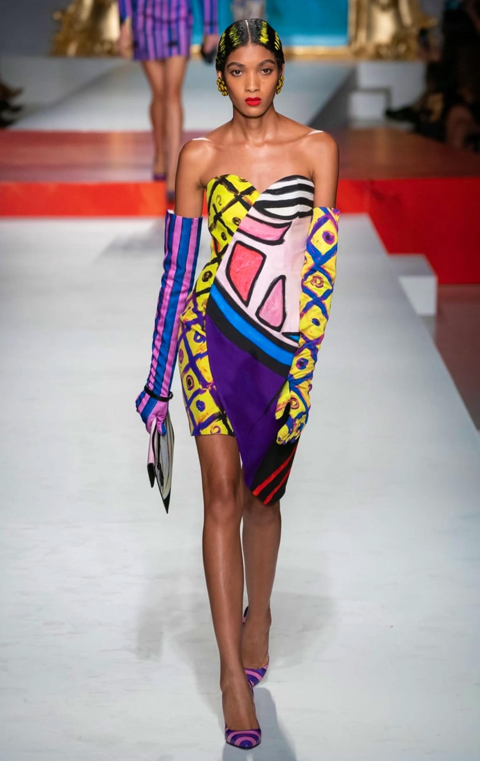 
Original Moschino Couture documented Runway Dress. Amazing rare Avant-Garde couture piece, asymmetrical corset dress with the most surreal vibrant colour combination. The SS2020 collection was inspired by famous abstract paintings and the whole