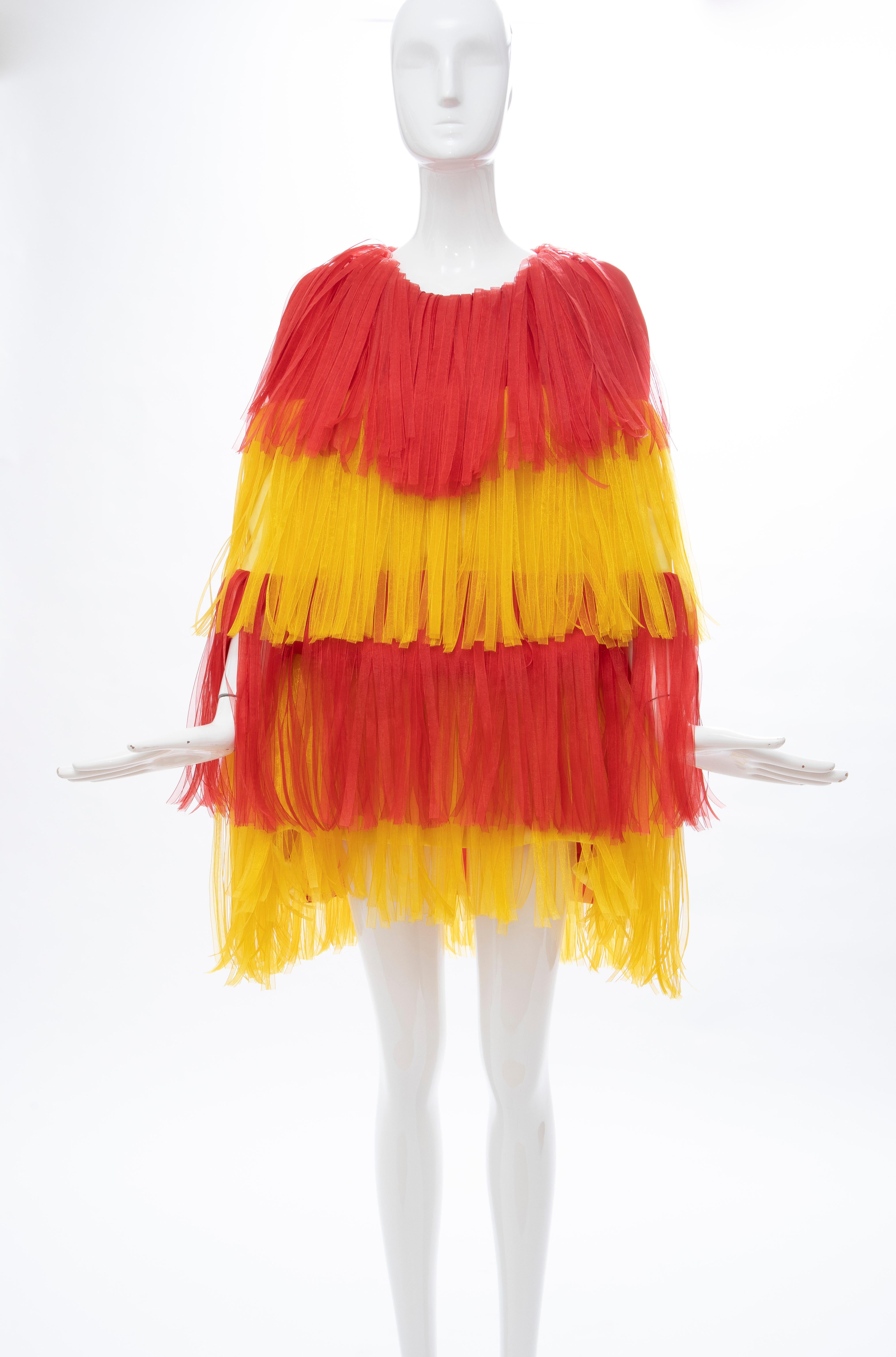 Moschino Couture Runway, (Look 50) Spring 2016, yellow, red silk fringe carwash dress, fully lined.

IT. 40, D. 36, FR. 36, GB. 8, US. 6

Bust: 40, Waist: 46, Hip: 50, Length: 35

Fabric: 100% Silk; Lining 52% Rayon, 48% Acetate; Combo 100% Nylon