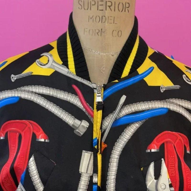 Moschino couture silk bomber jacket wrenches

Take the sporty look up a notch wearing this silk bomber style jacket with fun wrench designs all over. Pair with black skinny pants and boots with a turtleneck sweater or with a pencil skirt and heels.