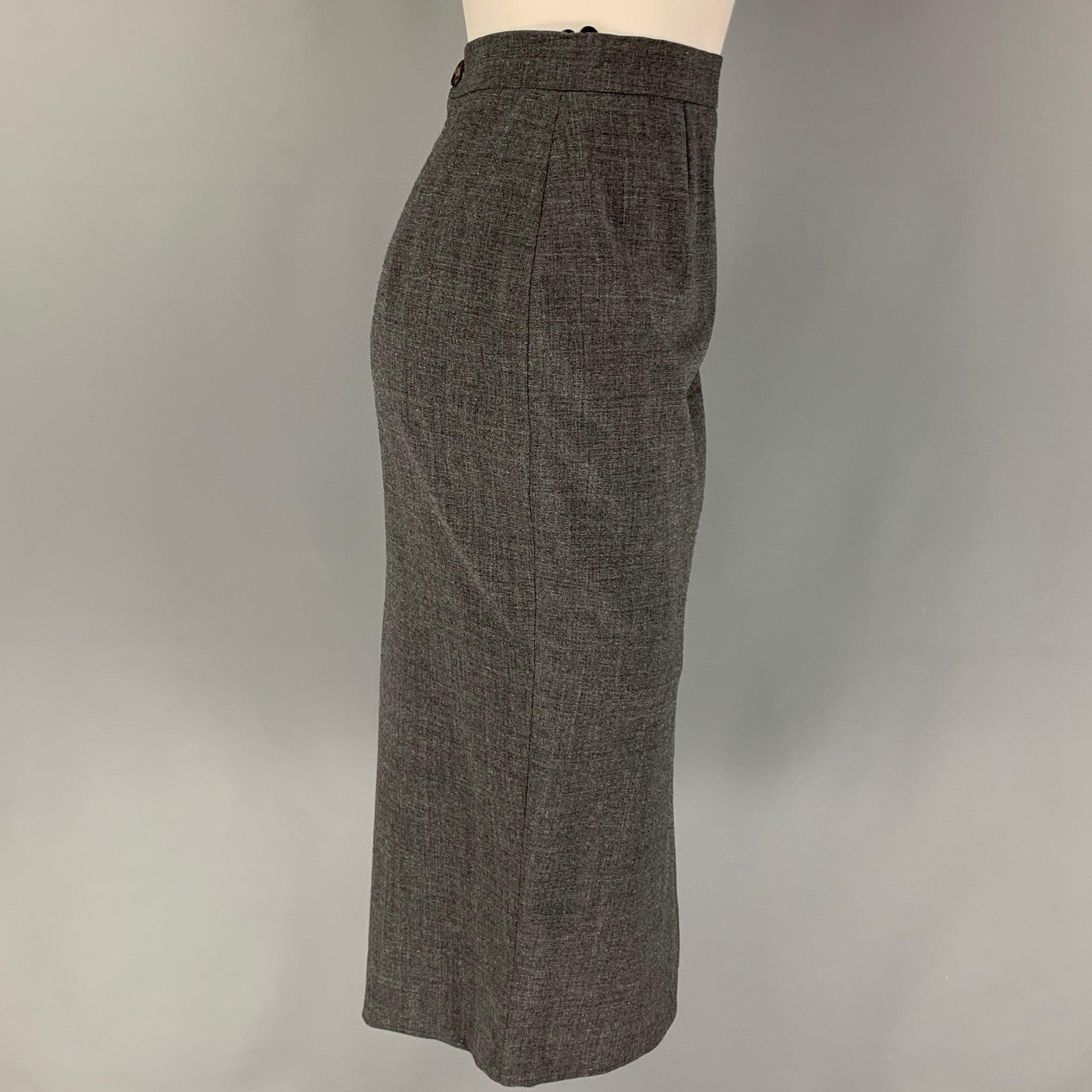 MOSCHINO COUTURE skirt comes in a grey wool / polyamide featuring a pencil style, 'secrets' slit design, and a back zip & button closure. Made in Italy. Very Good
Pre-Owned Condition. 

Marked:   I 10 / D 36 / F 36 / GB 8 / USA 6 

Measurements: 
 