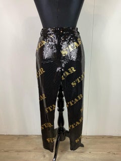 Moschino Couture trousers in black sequins with gold lettering