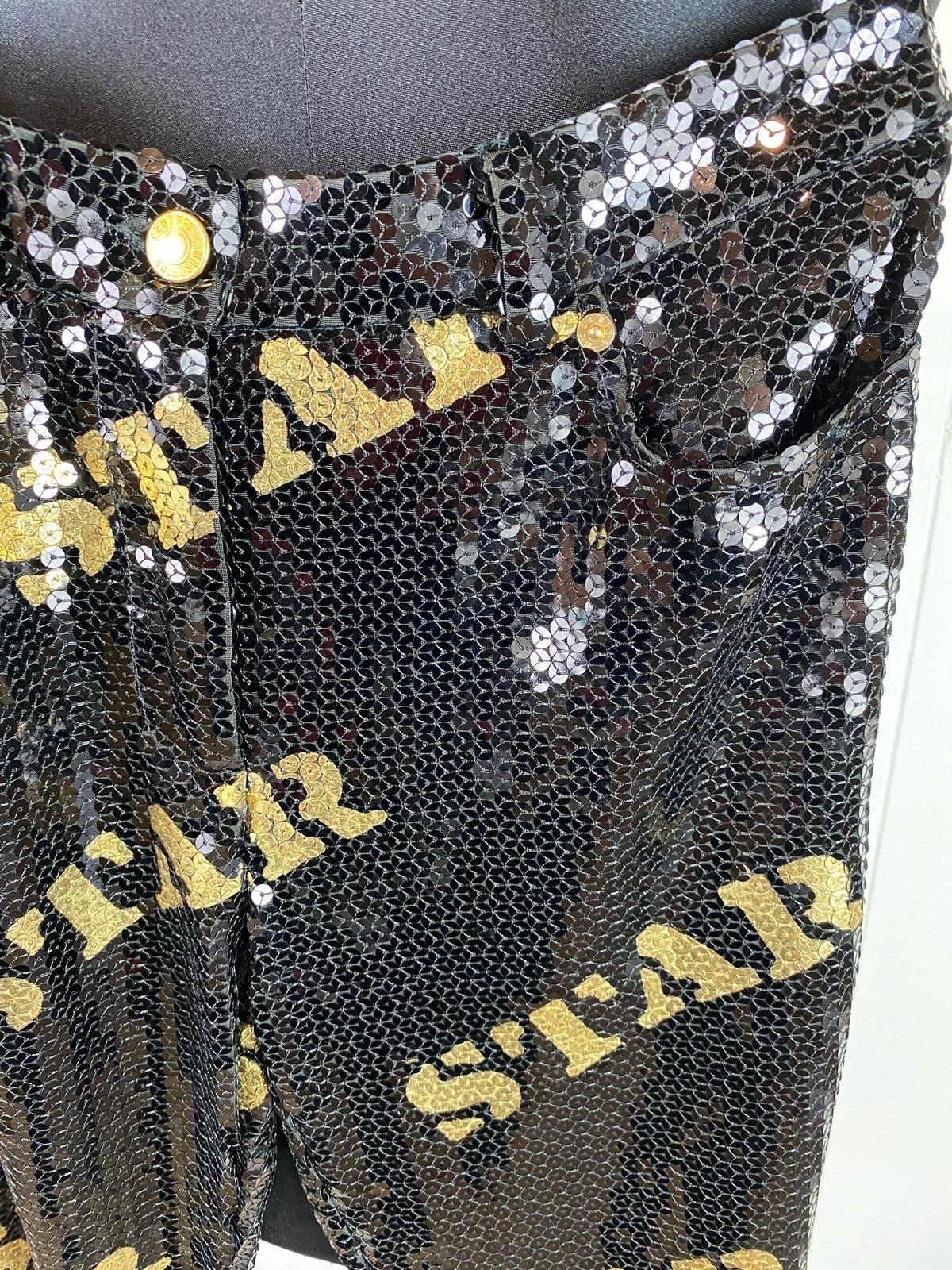Black Moschino Couture trousers in black sequins with gold lettering For Sale