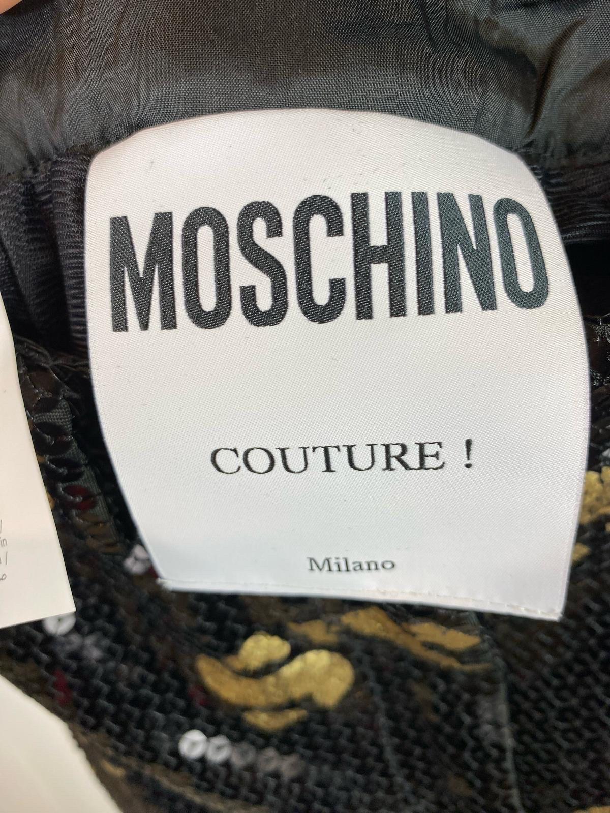 Women's or Men's Moschino Couture trousers in black sequins with gold lettering For Sale