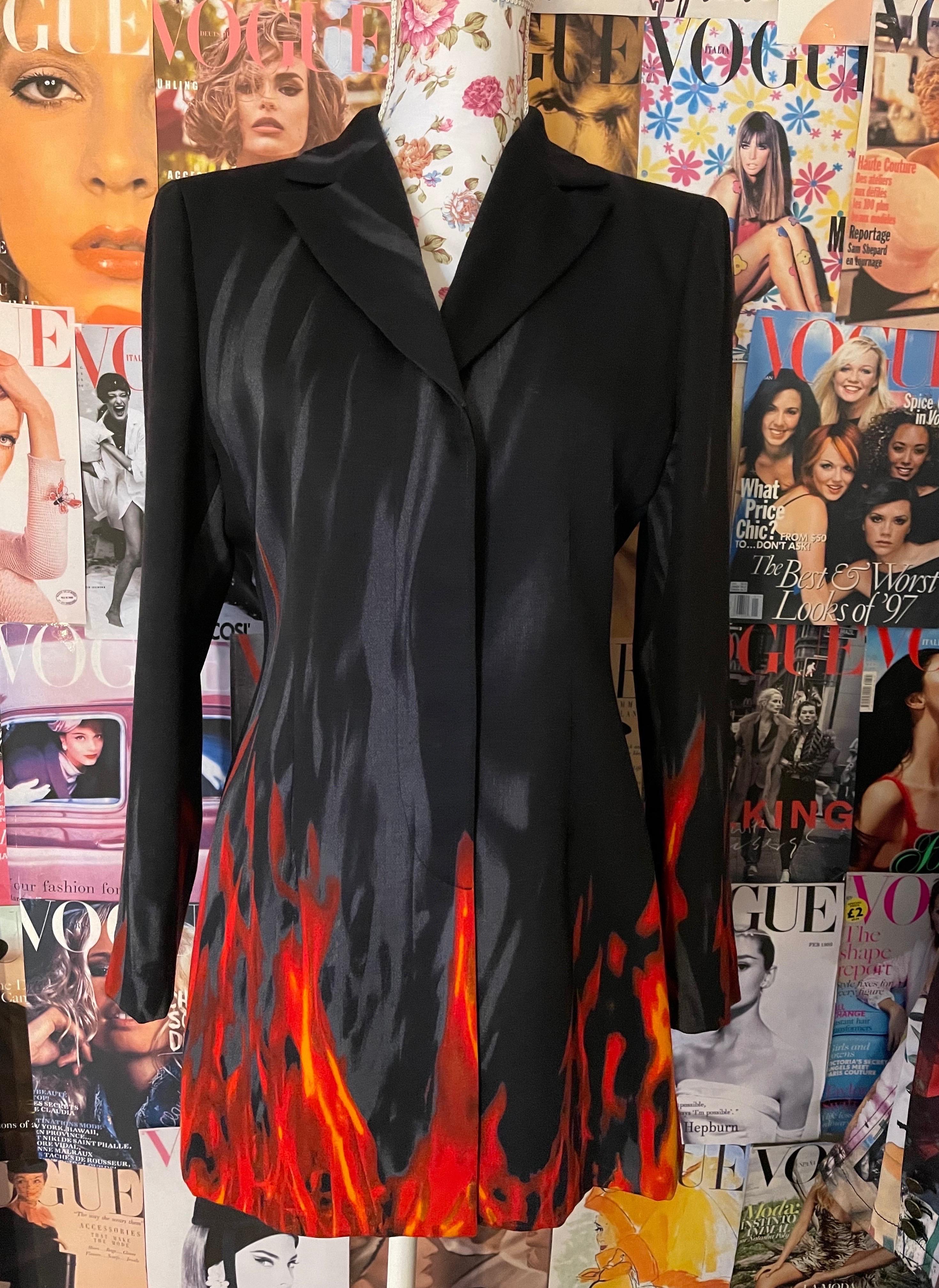 1990s Vintage flames print blazer by Italian designer Franco Moschino for Moschino Couture, it has been worn by Fran Drescher on the Nanny sitcomI
The blazer is in Perfect condition unfortunately I don't have the matching pants
It is marked as 38 