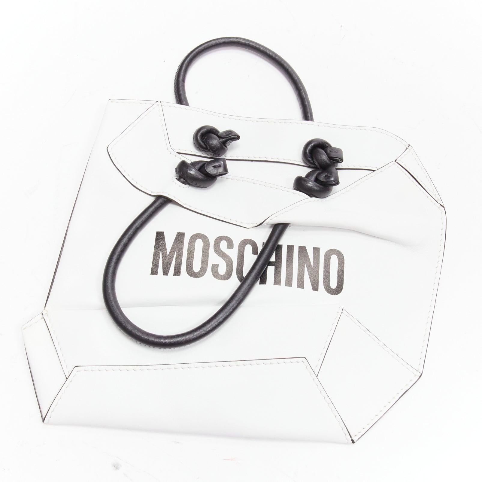 Women's MOSCHINO COUTURE white optical 2D flat shopping tote leather clutch bag For Sale
