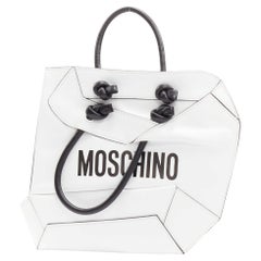 MOSCHINO COUTURE white optical 2D flat shopping tote leather clutch bag