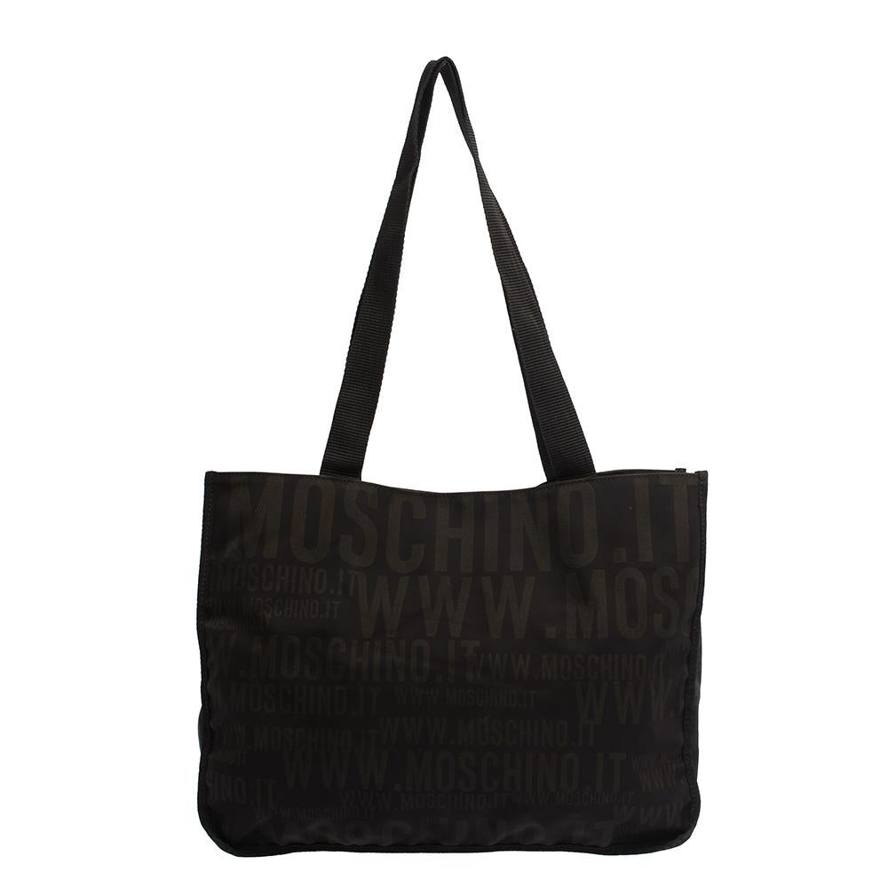 This nylon shopper tote from Moschino has been fabulously designed with a front zipper pocket and the logo print all over. It comes with a satin-lined interior. This tote is held by two top handles and accompanied by a zip pocket on the